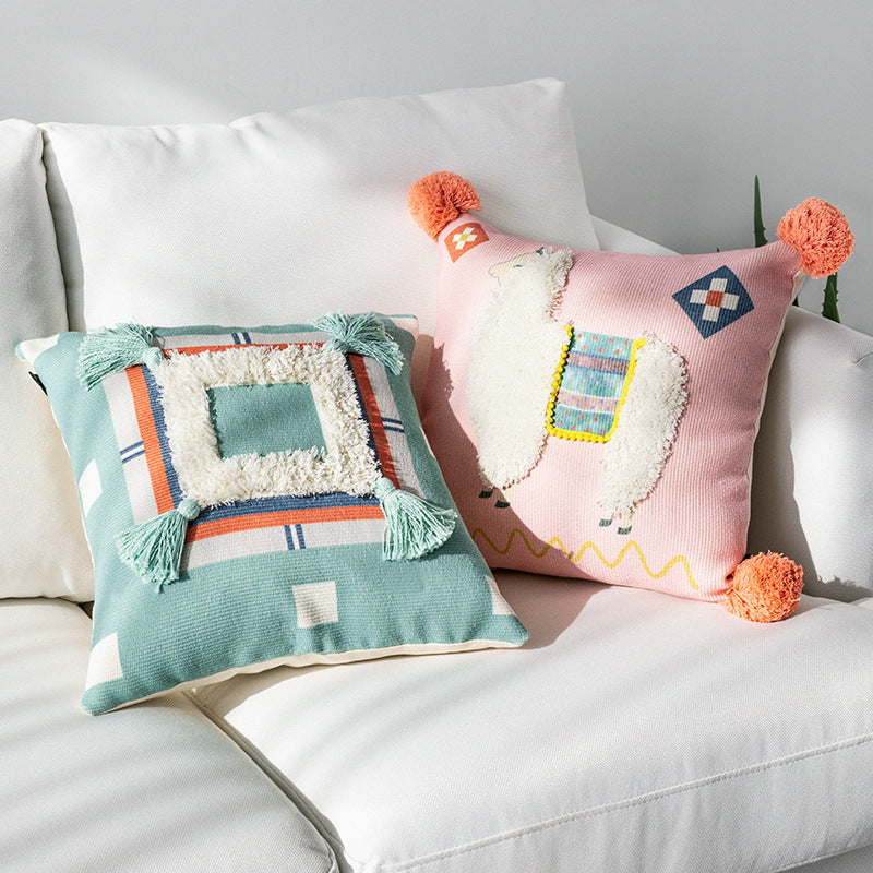 Square cushion cover with 3D alpaca appliqué, bouclé patch and pom-pom corners Bowlift