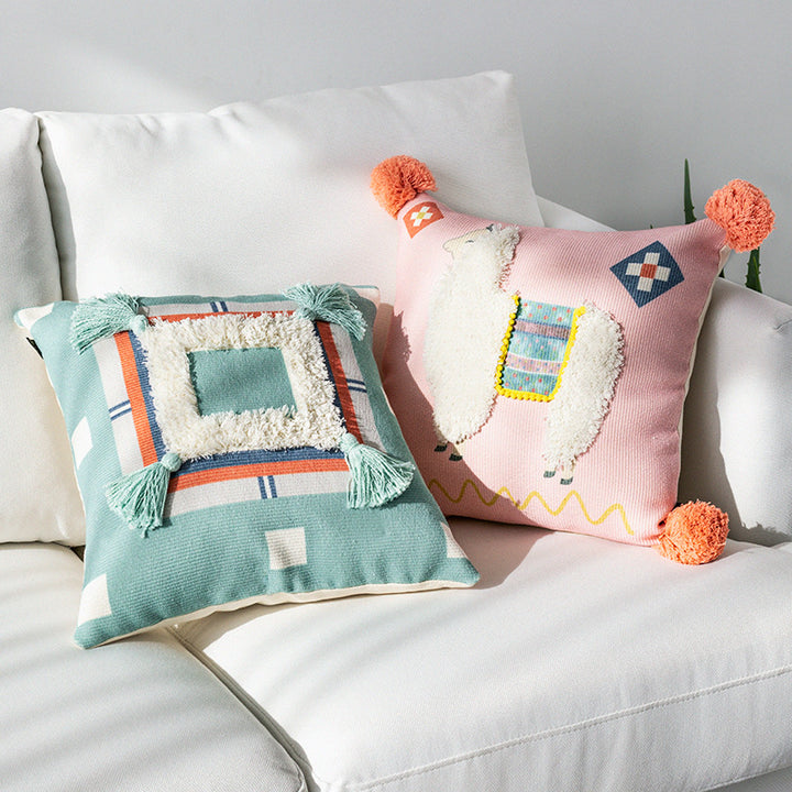 Square cushion cover with 3D alpaca appliqué, bouclé patch and pom-pom corners Bowlift