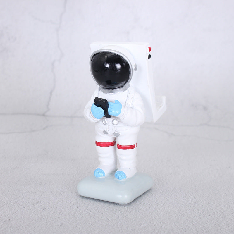 Astronaut-Themed Smartphone Stand