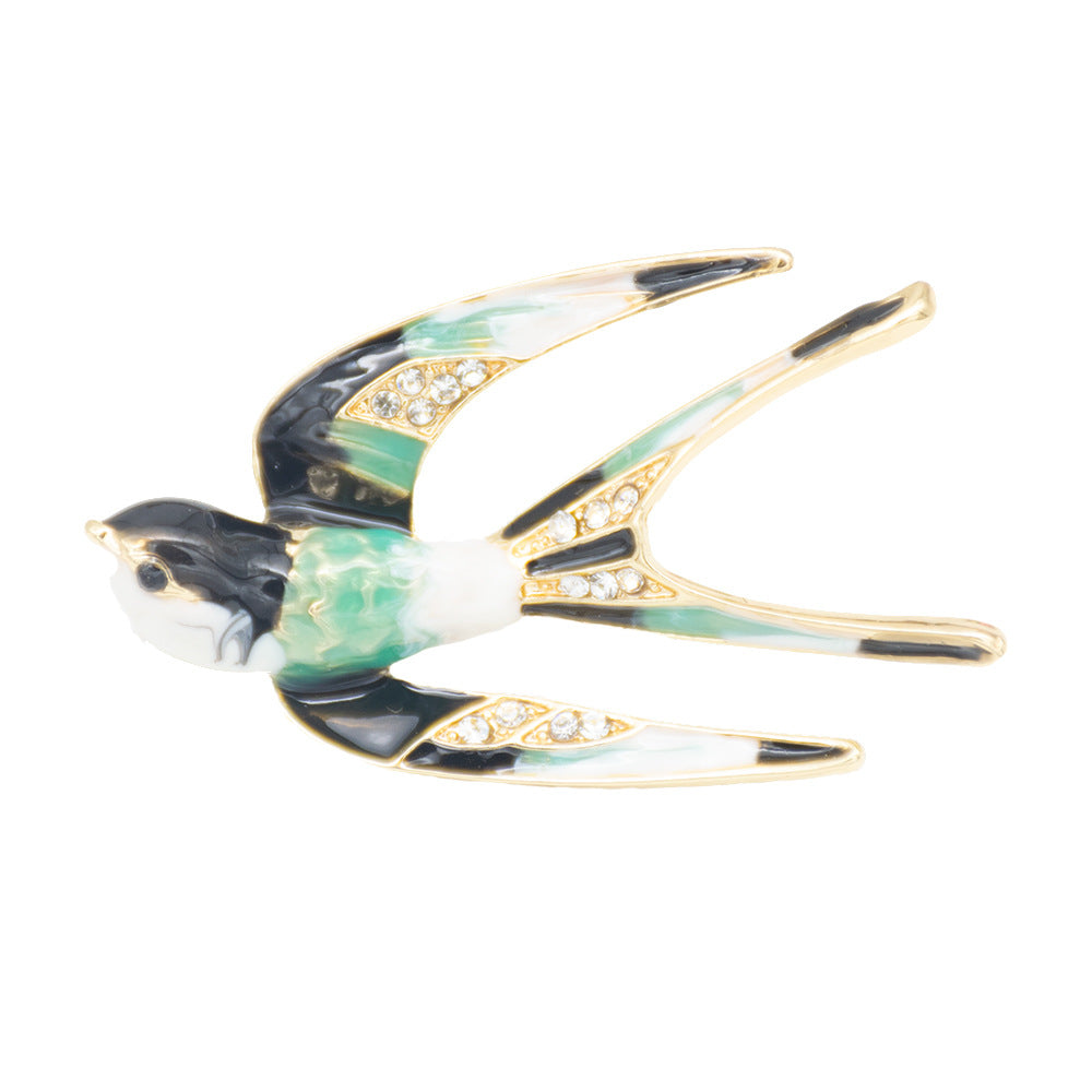 Ornate Bird-Inspired Enamel Brooch Bowlift