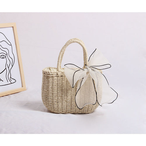 Handcrafted rattan bag with refined details Bowlift