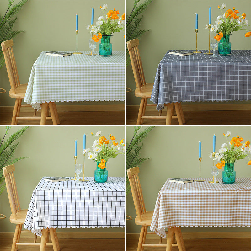 Wipeable tablecloth with fine check pattern, wavy hem and easy-care PVC finish Bowlift