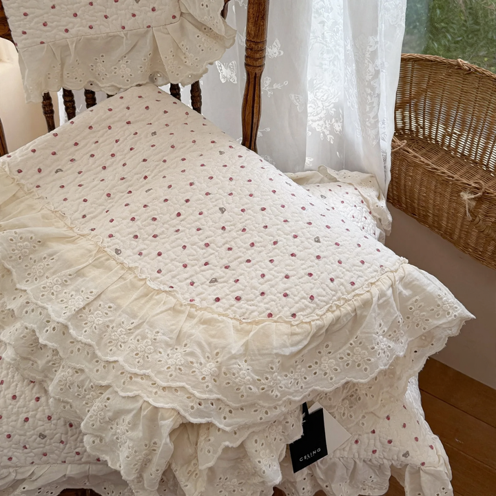 Cotton bedspread with lace trim, quilted
