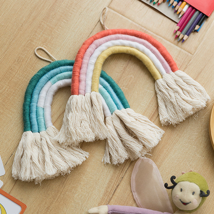 Macrame wall hanging in rainbow shape, handcrafted cotton yarn decorative element Bowlift