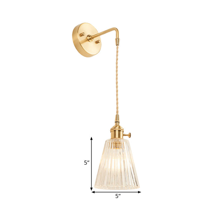 BowLift | A wall light with a bulb and conical shade made of clear, textured glass, industrial bedroom wall light fixture