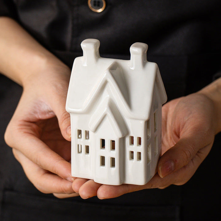 Decorative candle house made of white porcelain