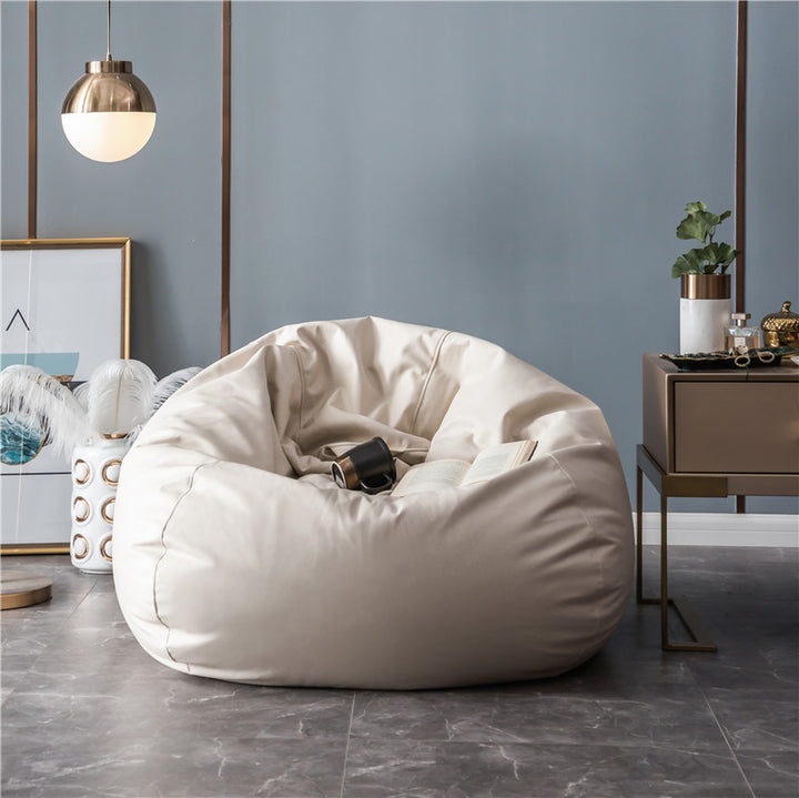 Large format bean bag lounge chair made of water-repellent canvas with a shape-stable foam filling core