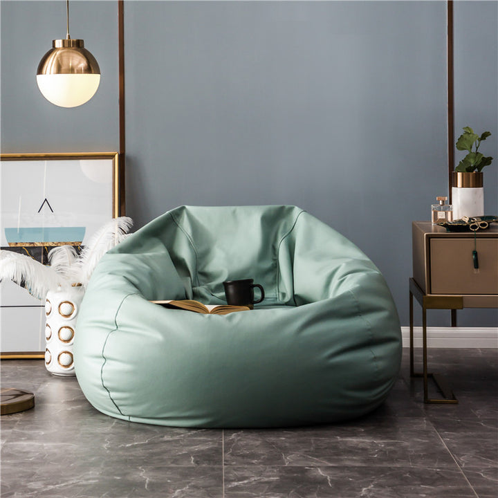 Large format bean bag lounge chair made of water-repellent canvas with a shape-stable foam filling core
