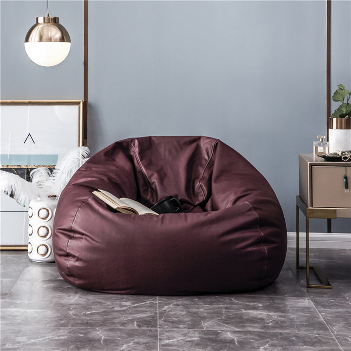 Large format bean bag lounge chair made of water-repellent canvas with a shape-stable foam filling core
