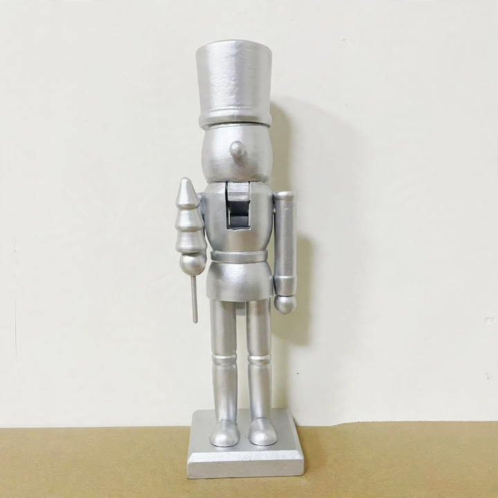 Nutcracker figure made of wood, silver-colored