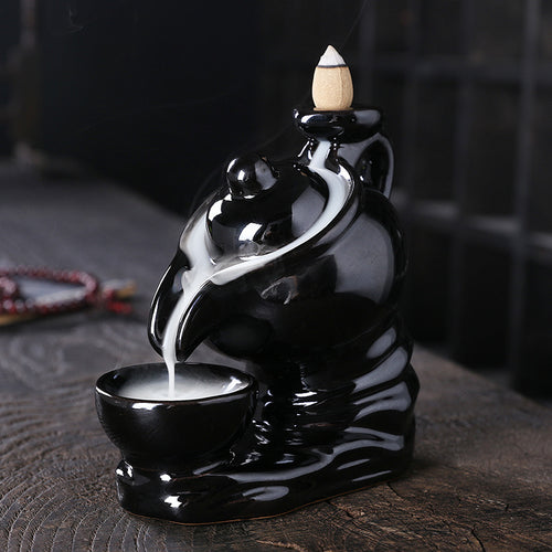 Elegant ceramic teapot-shaped incense burner