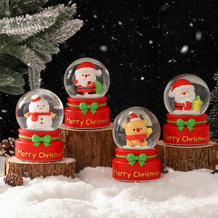 Illuminated glass snow globe with snow effect