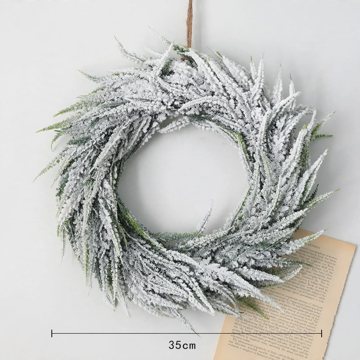 Decorative Christmas wreath in Nordic style with snow look