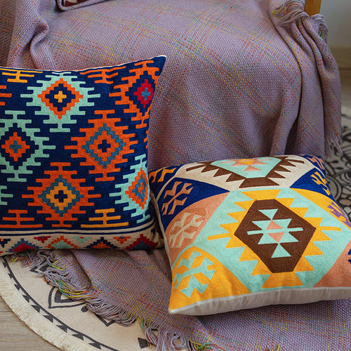 Woven decorative cushion cover with hand-tufted ethnic zigzag pattern