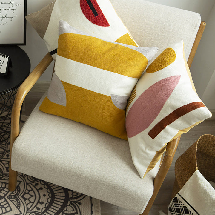 Geometric hand-tufted cotton cushion cover with textured appliqué
