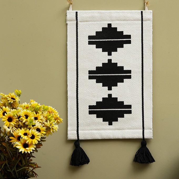Woven wall hanging with graphic ethnic relief and tassels Bowlift