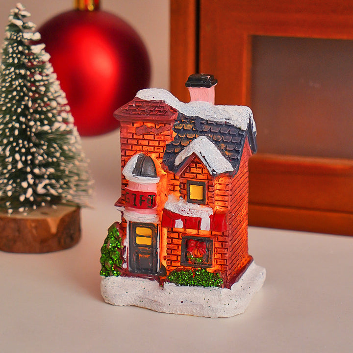 Illuminated Christmas miniature house made of resin