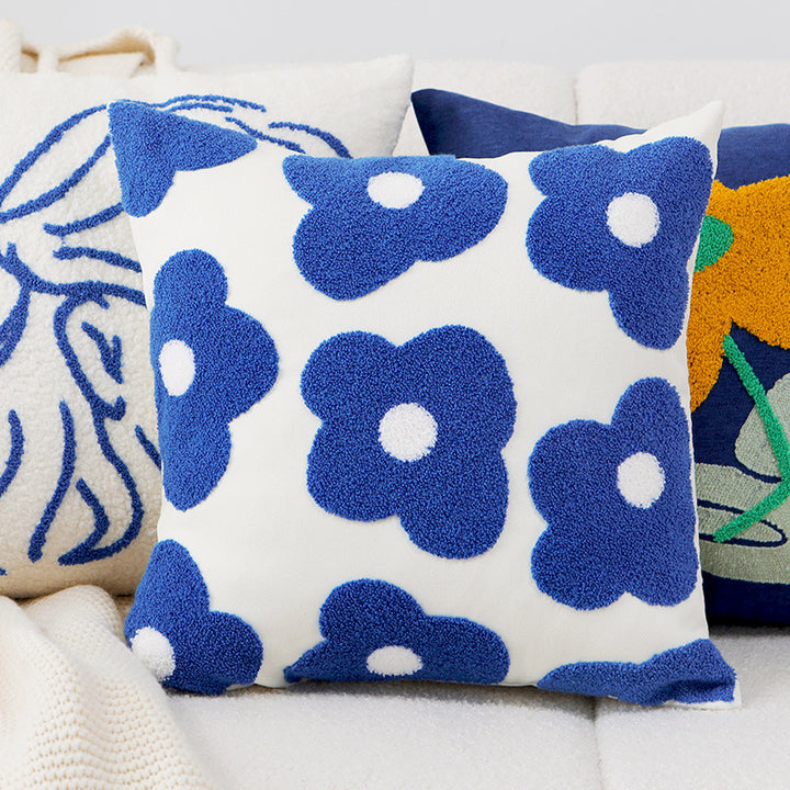 Pillowcase with embroidered daisy motif