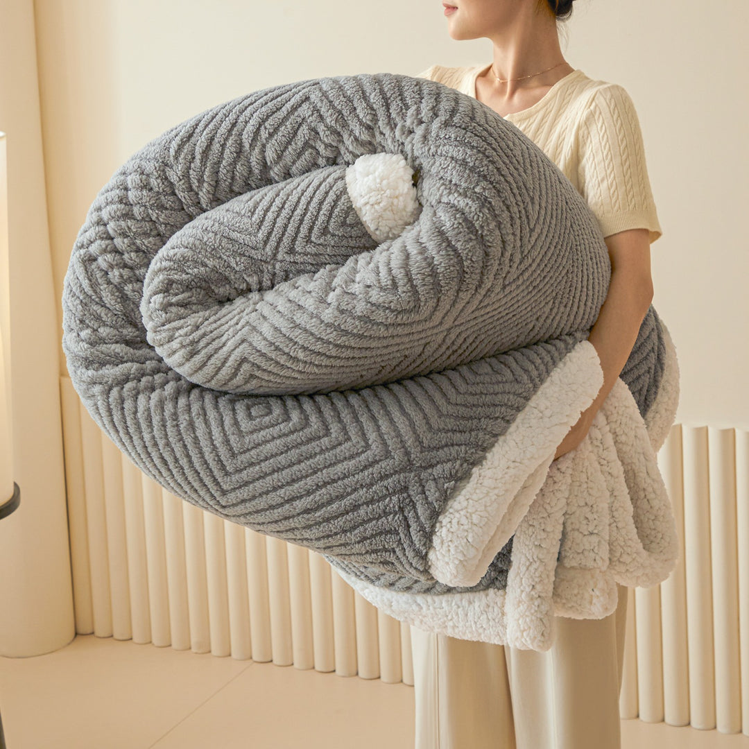 Double-sided lamb fleece blanket with geometric pattern