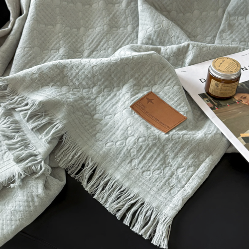Cotton gauze blanket with tassels, versatile to use