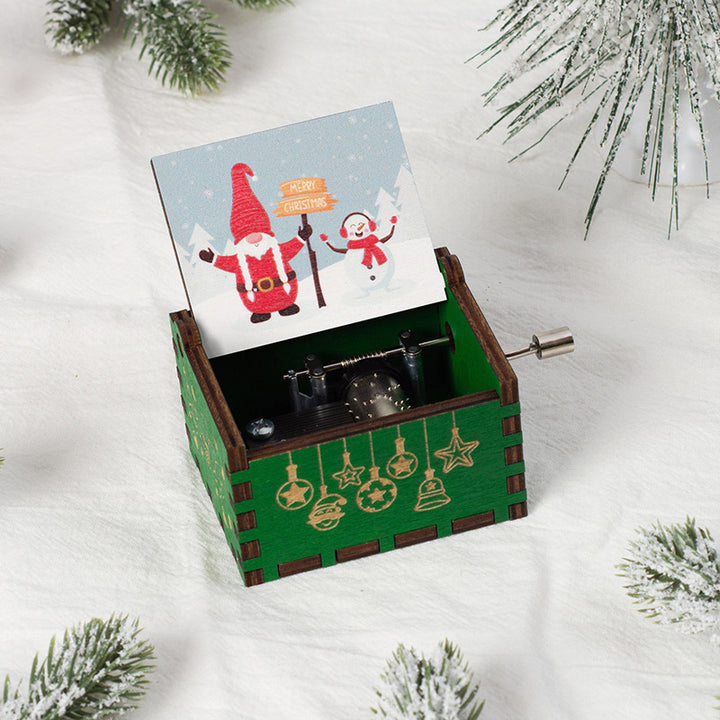 Manual wooden music box with crank