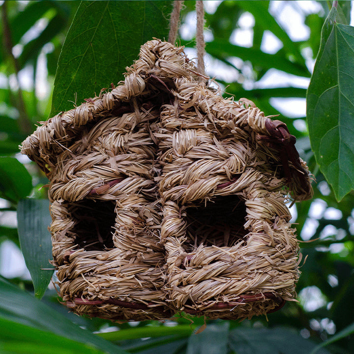 Handwoven birdhouse made of natural grass