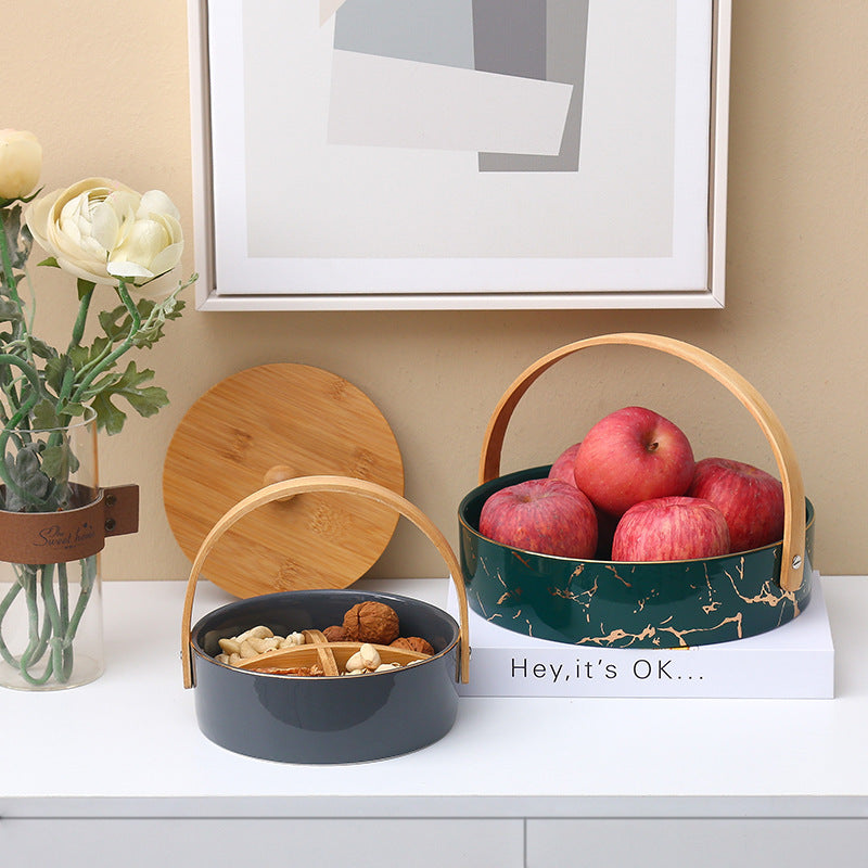 Kitchen organizer with bamboo handle and four-part insert, marbled snack bowl