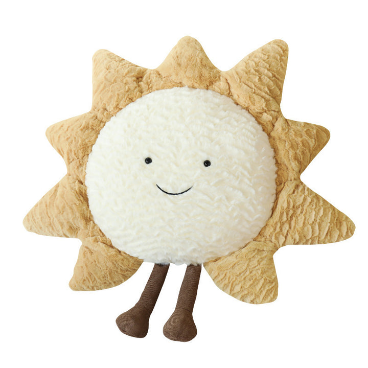 Decorative cuddle cushions with moon, star, and sun motif