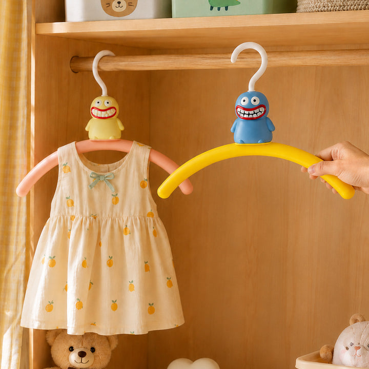 Plastic clothes hanger with monster design
