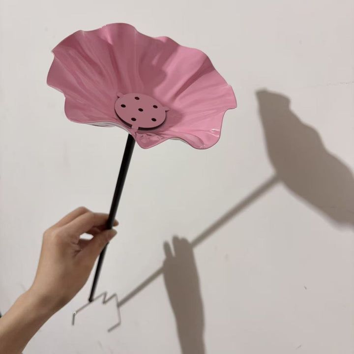 Handcrafted flower feeder made of metal