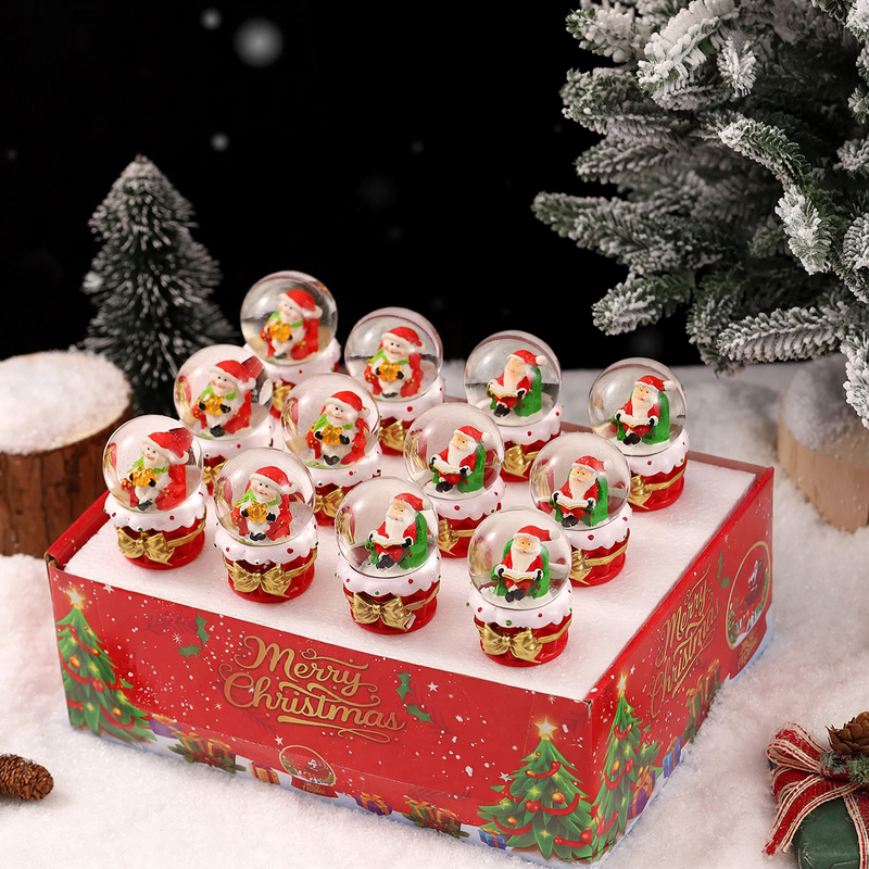 Illuminated glass snow globe with snow effect