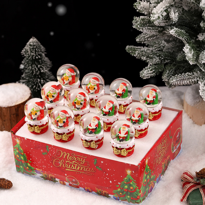 Illuminated glass snow globe with snow effect