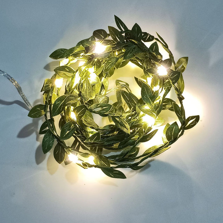 LED light chain with artificial leaves