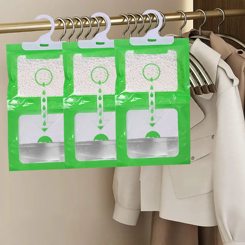 Hanging dehumidifying bag for wardrobes