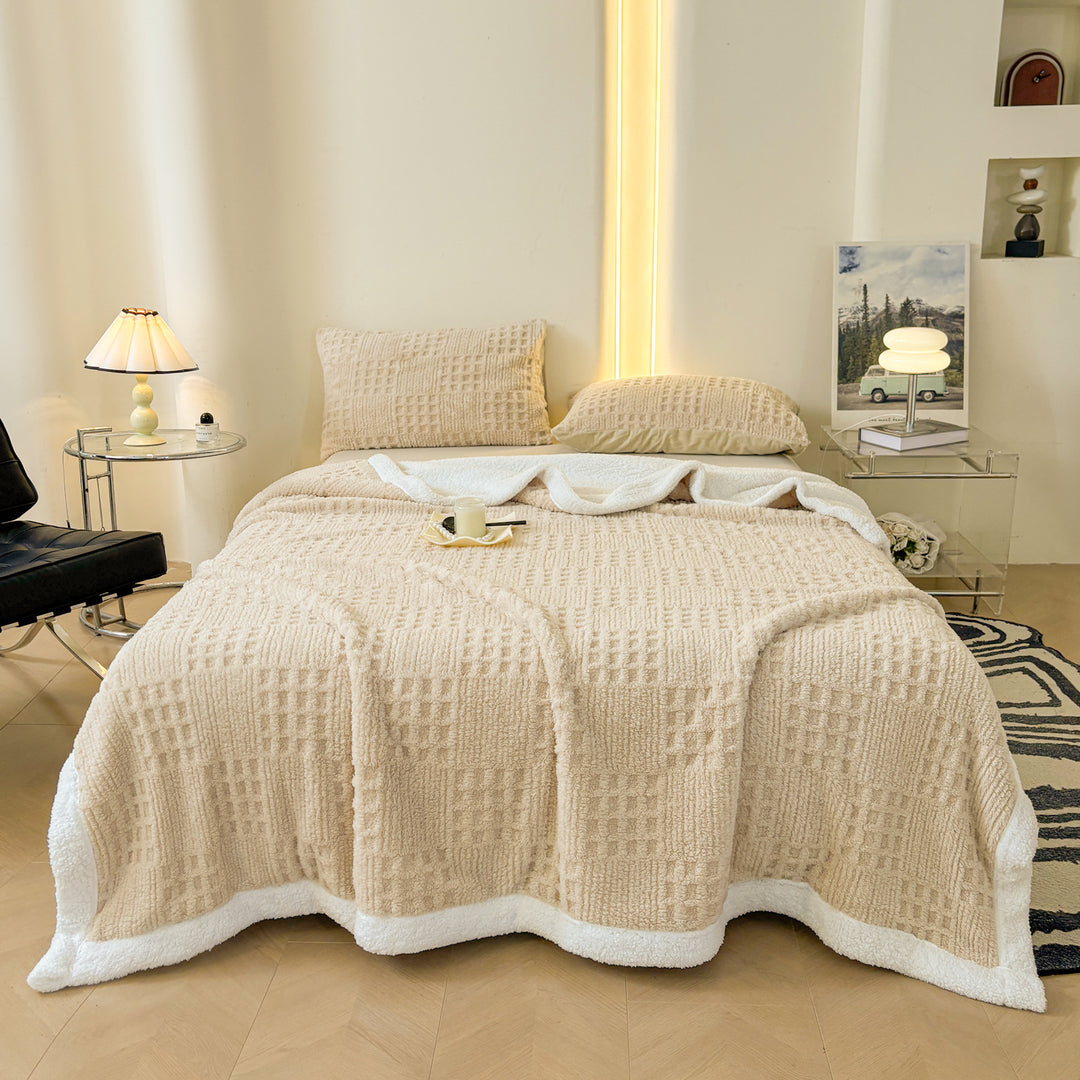 Versatile coral fleece blanket with relief pattern