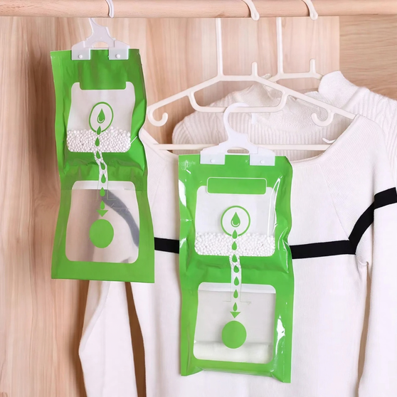 Hanging dehumidifying bag for the household