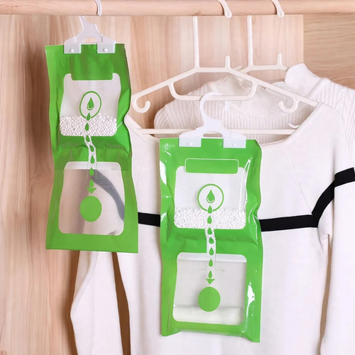 Hanging dehumidifying bag for the household