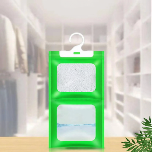 Hanging moisture absorber bag for the household