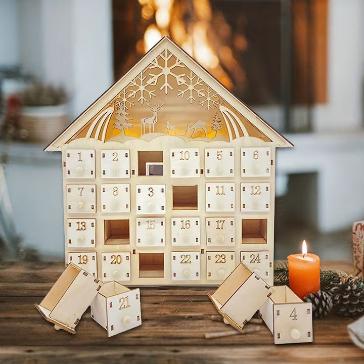 Illuminated wooden Advent calendar in cabin design