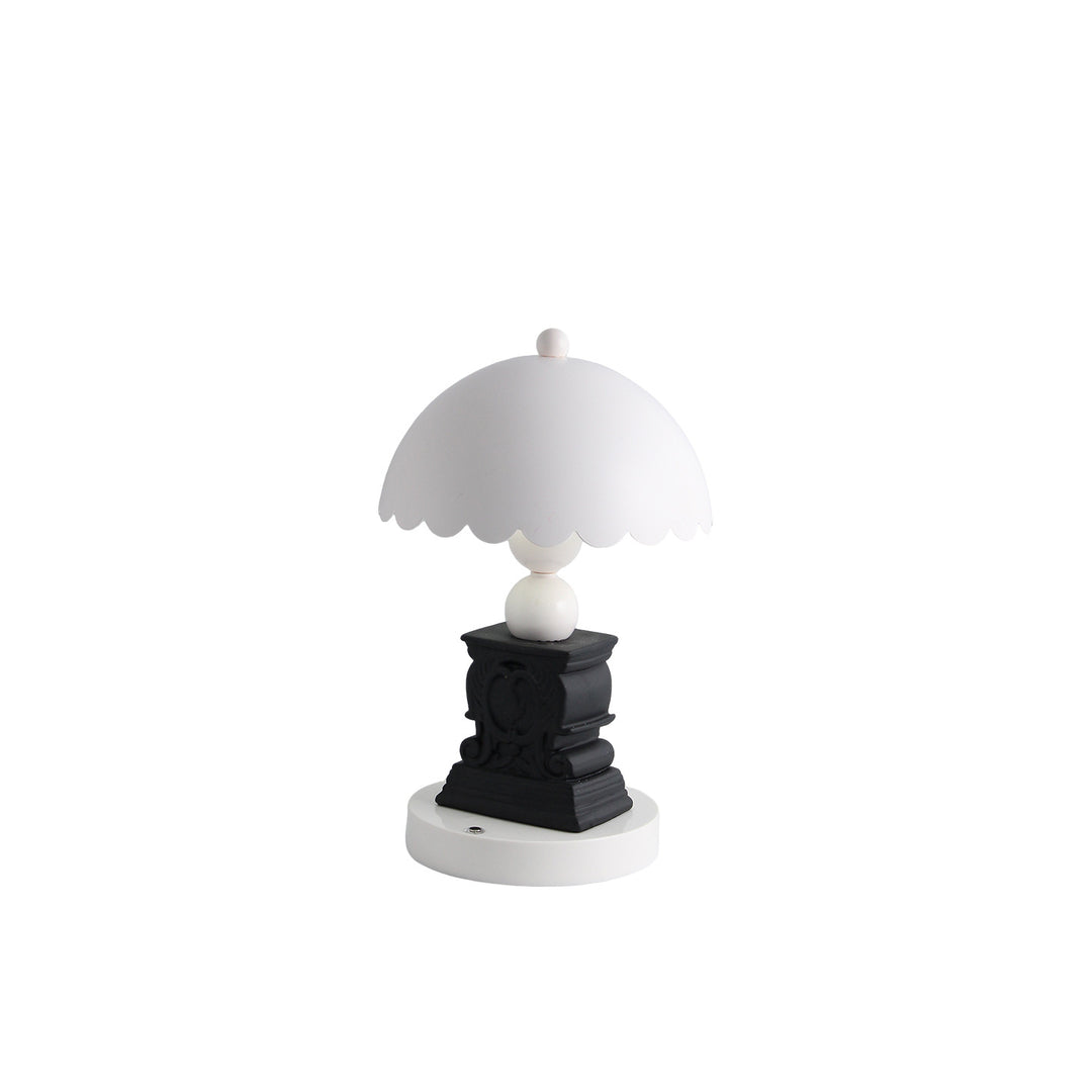 Table lamp with column shape and relief pattern