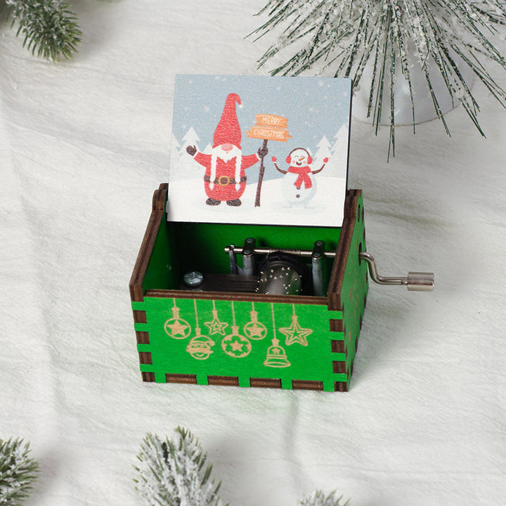 Manual wooden music box with crank