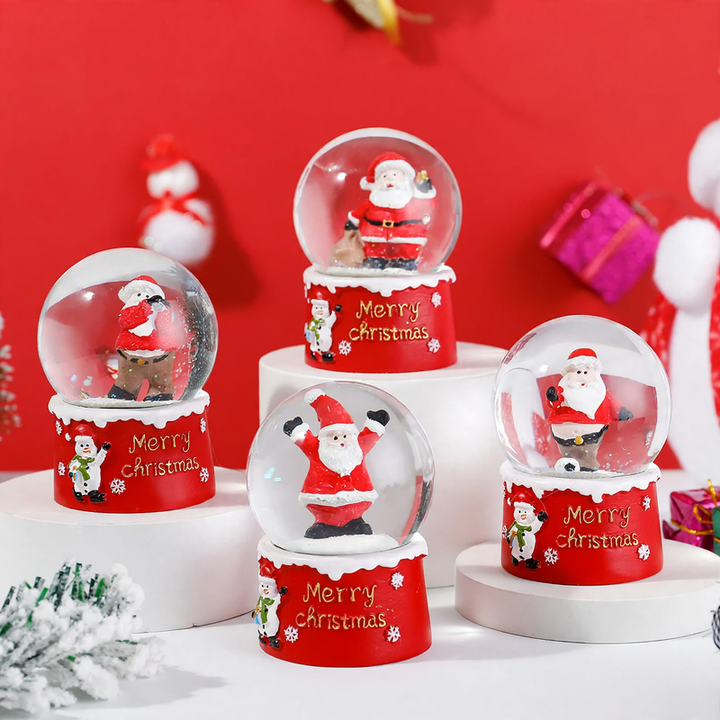 Christmas snow globe with lighting and glitter effect