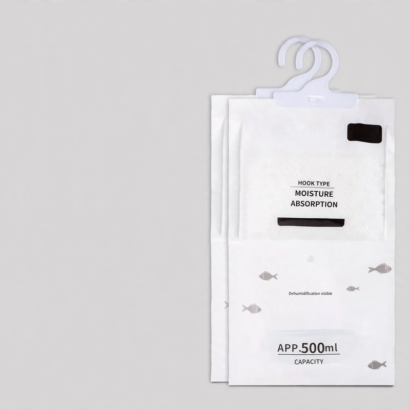 Hanging dehumidifying bag for wardrobes