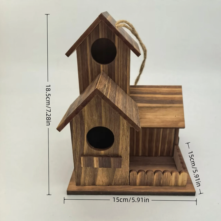 Two-story birdhouse made of carbonized pine wood