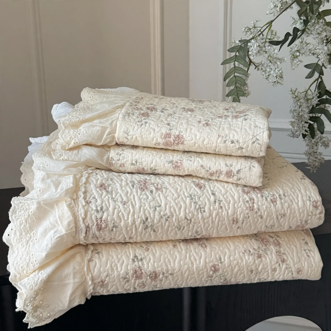 Cotton bedspread with lace trim, quilted