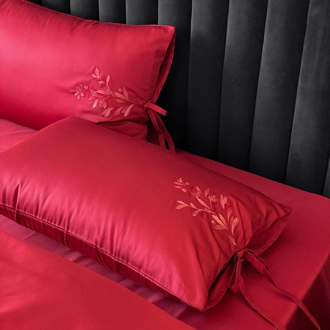 Embroidered cotton bedding with floral design