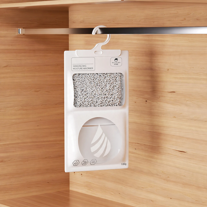 Hanging dehumidifier bag for wardrobes