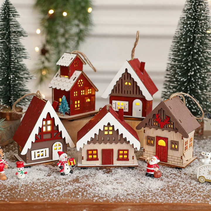 Illuminated wooden house for Christmas decoration