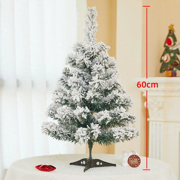 Flocked mini Christmas tree, festive table decoration