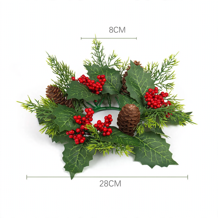 Christmas candle wreath with berries and cones